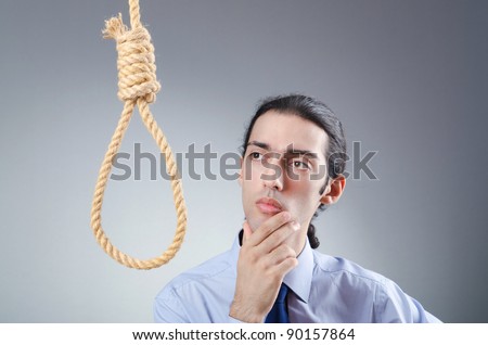 stock-photo-businessman-committing-suicide-through-hanging-90157864.jpg